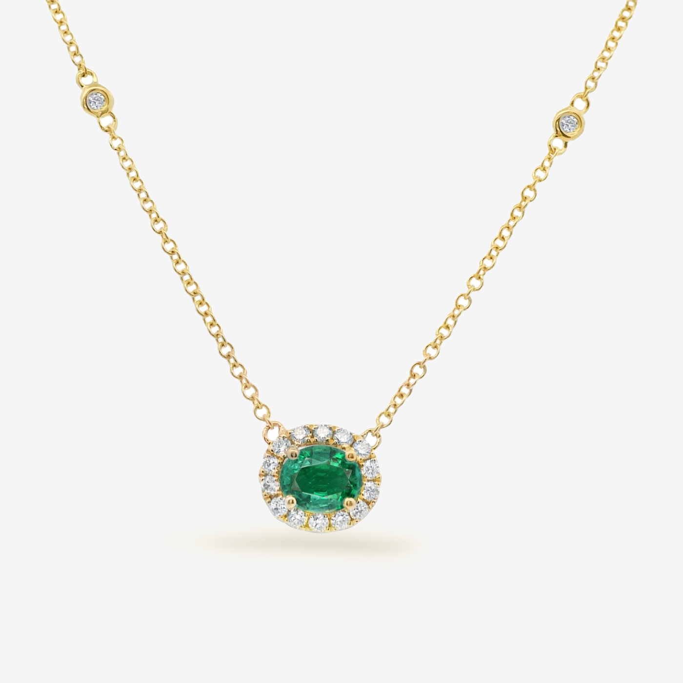 Oval Emerald and Diamond Halo Necklace