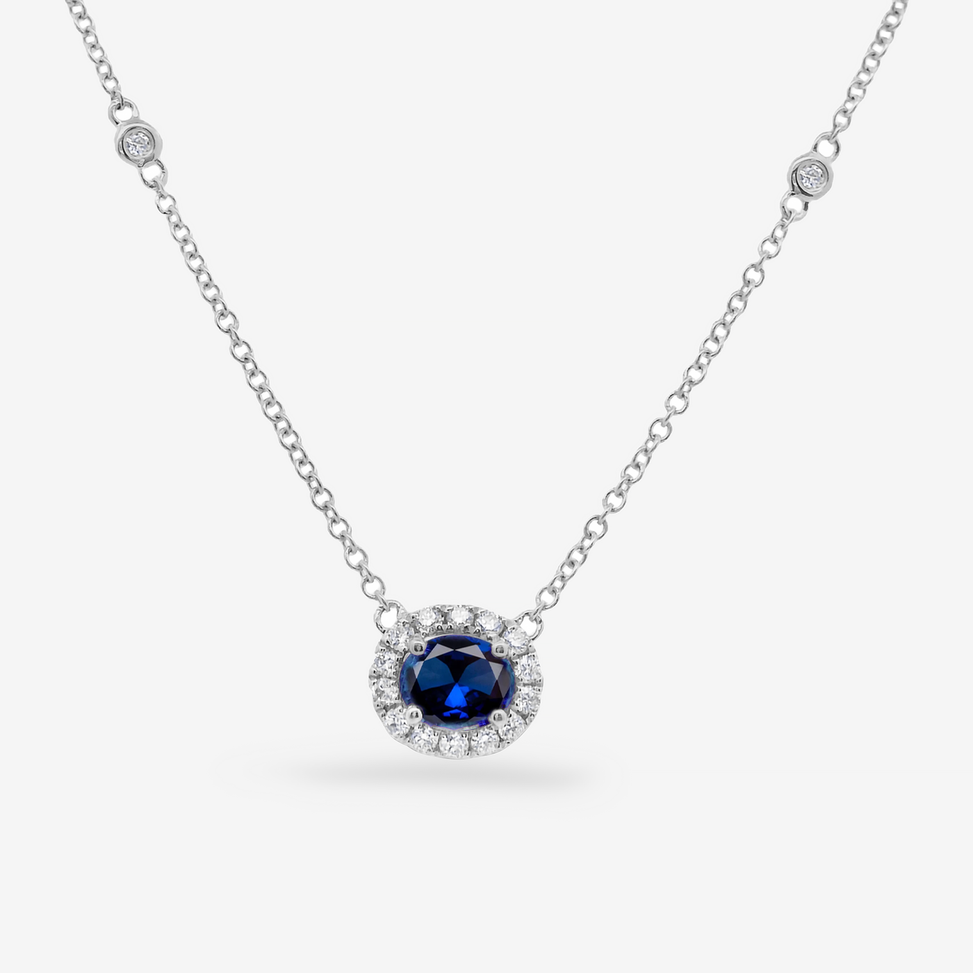 Oval Sapphire and Diamond Halo Necklace