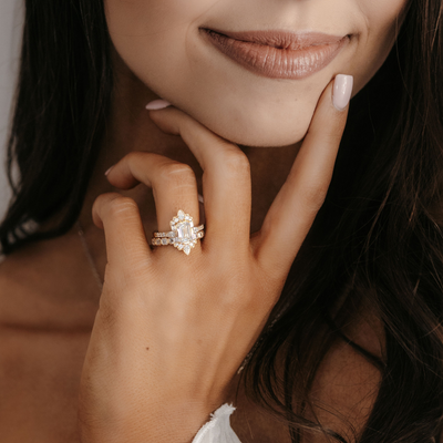 emerald cut diamond halo engagement ring